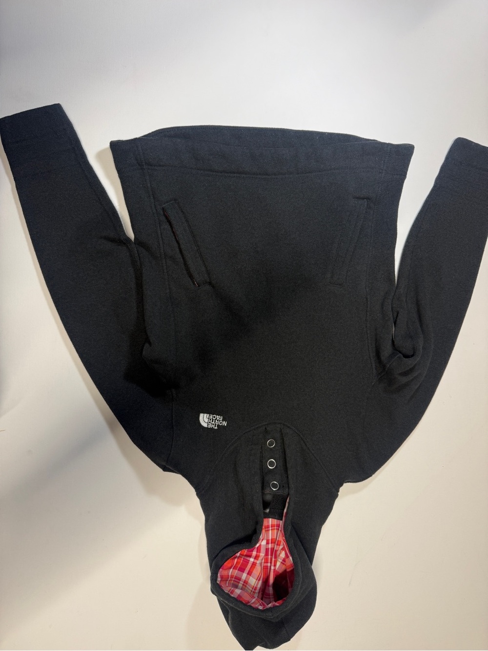The North Face Black Hoodie with Red Plaid Hood Lining